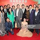 Netflix's 'Narcos: Mexico' Season 1 Premiere - Arrivals LOS ANGELES, CALIFORNIA - NOVEMBER 14: (L-R, center) Michael Pena, executive producer Eric Newman and Diego Luna pose with cast members at Netflix's 'Narcos: Mexico' Season 1 Premiere at Regal Cinemas L.A. Live on November 14, 2018 in Los Angeles, California.