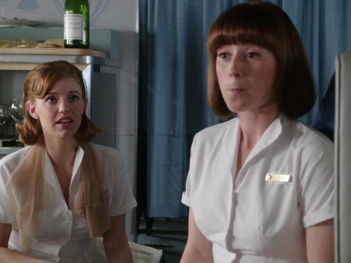 Kelli Garner and Karine Vanasse in Pan Am (2011)