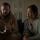 Jess Hong and John Bradley in 3 Body Problem (2024)