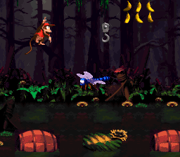 Diddy Kong jumping to a Flitter in Mudhole Marsh of Donkey Kong Country 2: Diddy's Kong Quest