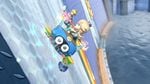 Rosalina driving along the wall of the dam