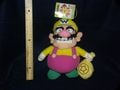 Wario holding a coin bag