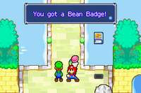 Mario receiving the Bean Badge in Mario & Luigi: Superstar Saga and Mario & Luigi: Superstar Saga   Bowser's Minions