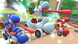 Blue Yoshi, White Yoshi, and Red Yoshi tricking on Paris Promenade 3R in Mario Kart Tour