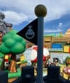 A Goal Pole-like flag with Bowser Jr.'s emblem on it at Super Nintendo World