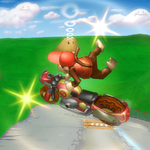 Diddy Kong performing his right trick on a bike