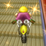 Wario performing a Trick in Mario Kart Wii