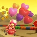 Toadette gliding on the course