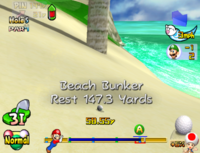 The ball in a beach bunker in Mario Golf: Toadstool Tour