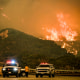 California Department of Forestry and Fire Protection supervisors look on as the Line Fire continues.