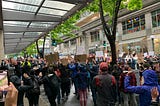 Black Lives Matters protestors with their hands up during a “Hands up” “Don’t Shoot” cry