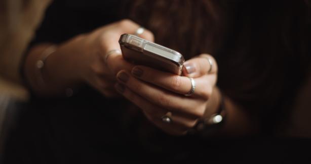 person holding cell phone