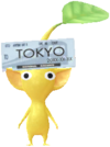 A Yellow Station Decor Pikmin with Ticket decor from Pikmin Bloom.