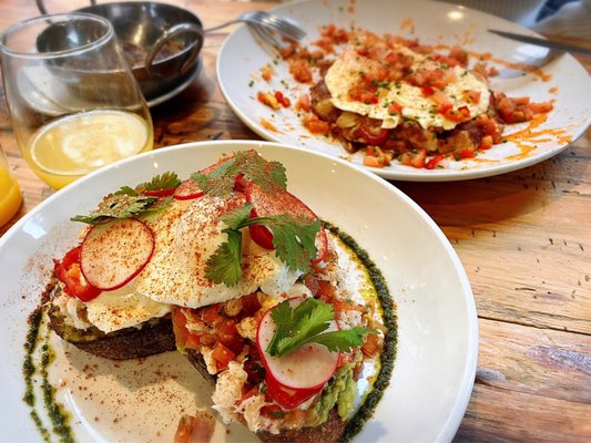 Photo of Crown Republic Gastropub - Cincinnati, OH, US. Crab Avocado Toast and Carnitas Hash