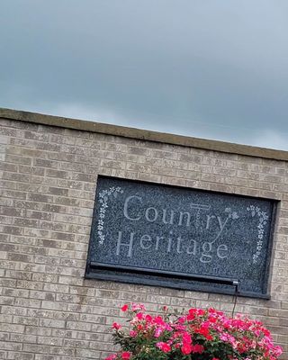 Photo of Country Heritage Winery & Vineyard - LaOtto, IN, US. sign on brick building