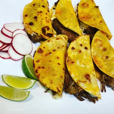 Photo of La Cazuela Mexican - Lynnwood, WA, US. a plate of tacos and radishes