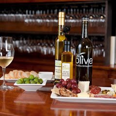 Photo of We Olive & Wine Bar - Shreveport, LA, US. Tapas style menu, artisan wines, and extra virgin olive oils and balsamic vinegars