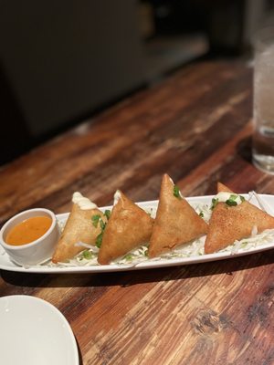 Photo of Zea Rotisserie & Bar - Lafayette, LA, US. Duck Empanadas with house sauce