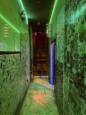 Photo of See-Scape - Toronto, ON, CA. a long hallway with stairs and graffiti on the walls