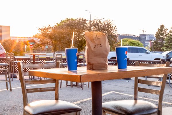 Photo of Taco Jed - Rochester, MN, US. a table and chairs in a parking lot