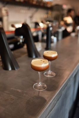 Photo of Penny Drip - Fort Wayne, IN, US. three glasses of coffee on a bar