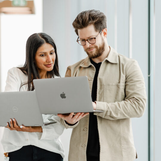 People looking at the new PLCMT definitions on a computer