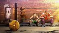 Little Mac and Doc Louis eating chocolate bars with Samus's Morph Ball and Sandbag on screen.