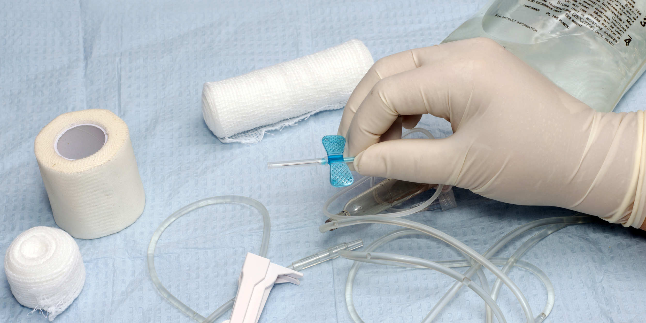 Nurse preparing a butterfly catheter for insertion. (Photo by: SCIENCE PHOTO LIBRARY via AP Images)