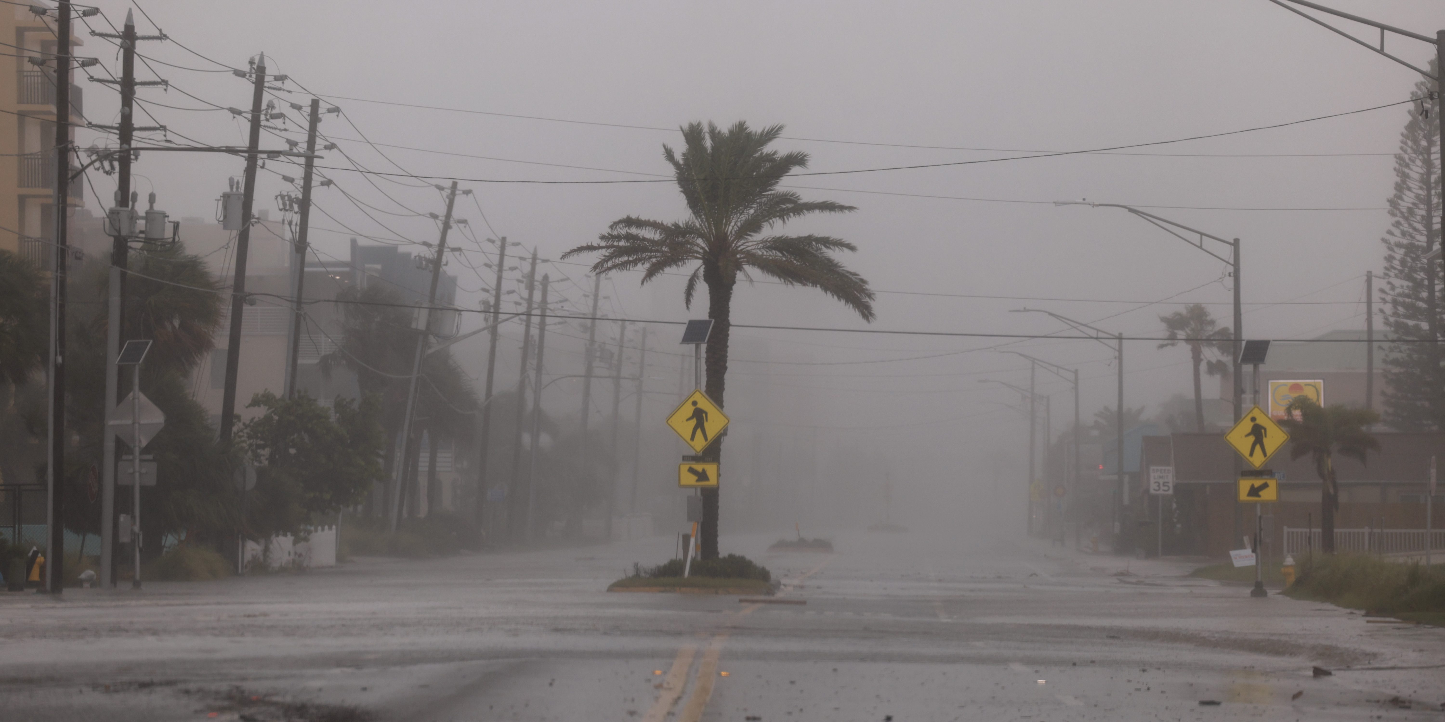 ST PETE BEACH, FLORIDA - SEPTEMBER 26: A road is empty of traffic as Hurricane Helene churns offshore on September 26, 2024, in St. Pete Beach, Florida. Already a Category 3 storm, Helene was expected to gain further strength before making landfall this evening on Florida’s northwestern coast. Flash flood warnings extend to northern Georgia and western North Carolina. (Photo by Joe Raedle/Getty Images)