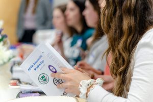 students at meeting