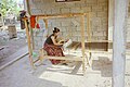 A women in one of the many 'weaving-villages' in the south of Laos, practicing her craft.