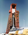 Atlas rocket with Antares upper stage carrying Fire 1 re-entry capsule at Gantry roll back (Sptember 30, 1963)