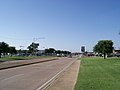 File:FM3504 Mill St at south terminus north from Bus 121.jpg