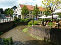 Village centre with river Gulp