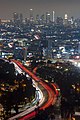 Nighttime view of Downtown L.A. and the Hollywood Freeway