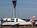 British Airways A320 in front of the tower at London Heathrow