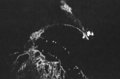 B-17s of the 11th Bombardment Group based at Espiritu Santo bomb the damaged Japanese battleship Hiei north of Savo Island on November 13, 1942. Hiei appears to be trailing fuel and smoking from fires.