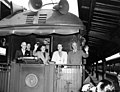 President Truman and his wife and daughter waving from the train during the 1948 campaign.