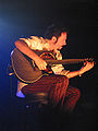 Steve Lukather playing a solo on a half-acoustic guitar