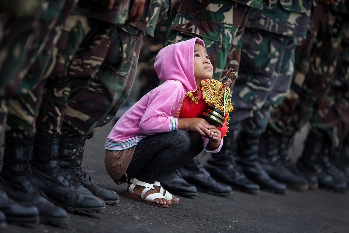 Child's Faith to Santo Niño by Michol Sanchez.