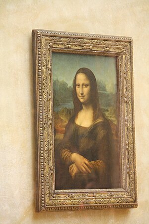 A photograph (NOT a digital surrogate) of the Mona Lisa (Q12418). It is taken from an angle, the frame is visible and the painting's image is distorted.