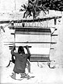 Hopi man weaving in 1879