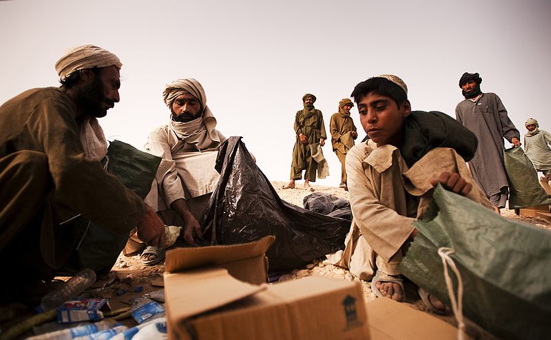 File:Afghan day laborers pick up trash (5224389173).jpg