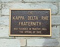 A plaque on Painter Hall at Middlebury College commemorating the founding of the Kappa Delta Rho fraternity