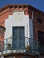 Balcón con escudo en Casa monumental.