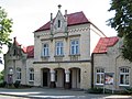 Polski: Budynek Państwowej Szkoły Muzycznej, dawna siedziba Rady Miejskiej