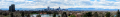 Panorama of Denver in early May, as seen from the Denver Museum of Nature and Science. Snow-capped Mount Evans can be seen to the left beyond the city skyline.}}