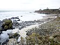 Écume de mer sur la plage lors d'une mer forte près de Pratmeur