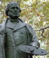 Statue of John Ericsson in Battery Park, holding a model of USS Monitor in his hand