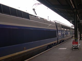 A double-decker TGV leaving Paris (Gare de Lyon station).